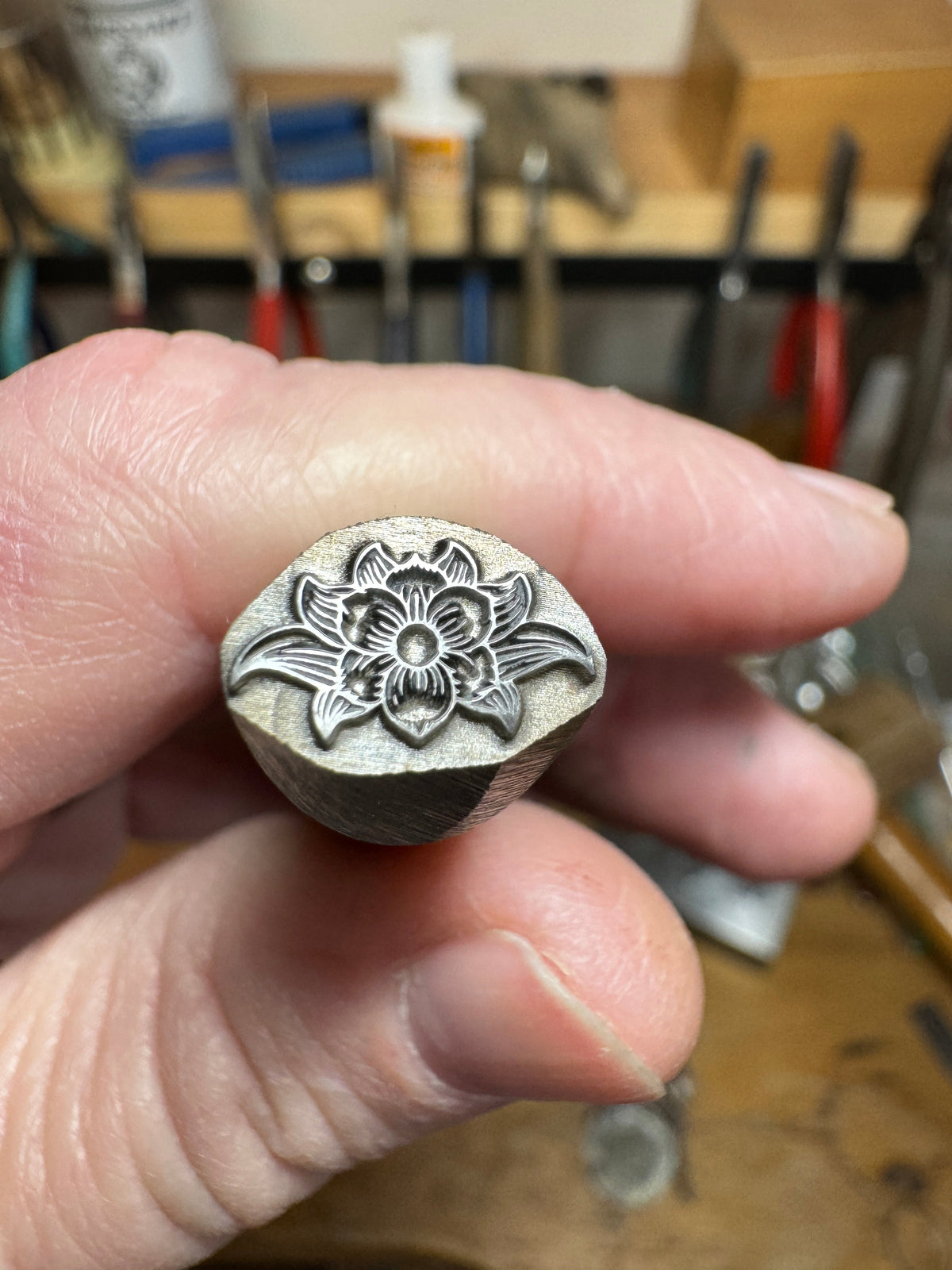Engraved flower stamp — Lion Punch Forge