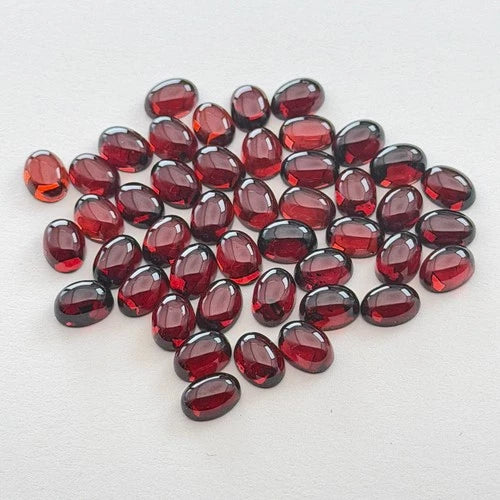 Garnet cabochon 7x5 oval