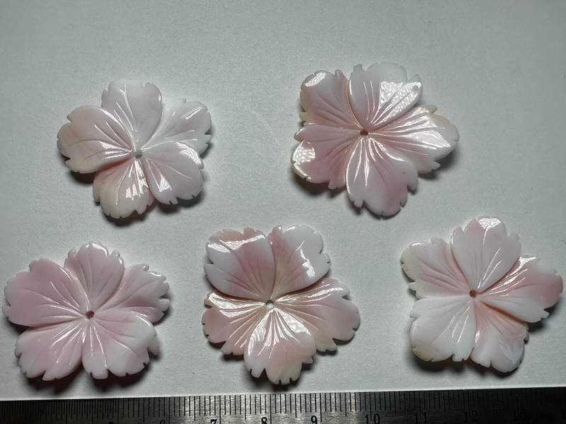 Conch shell flower carvings