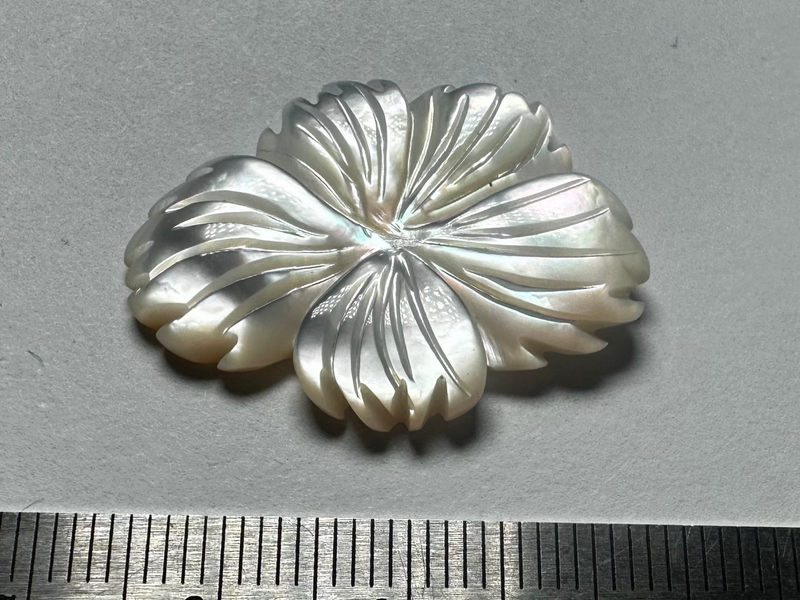Vintage mother of pearl carved flowers