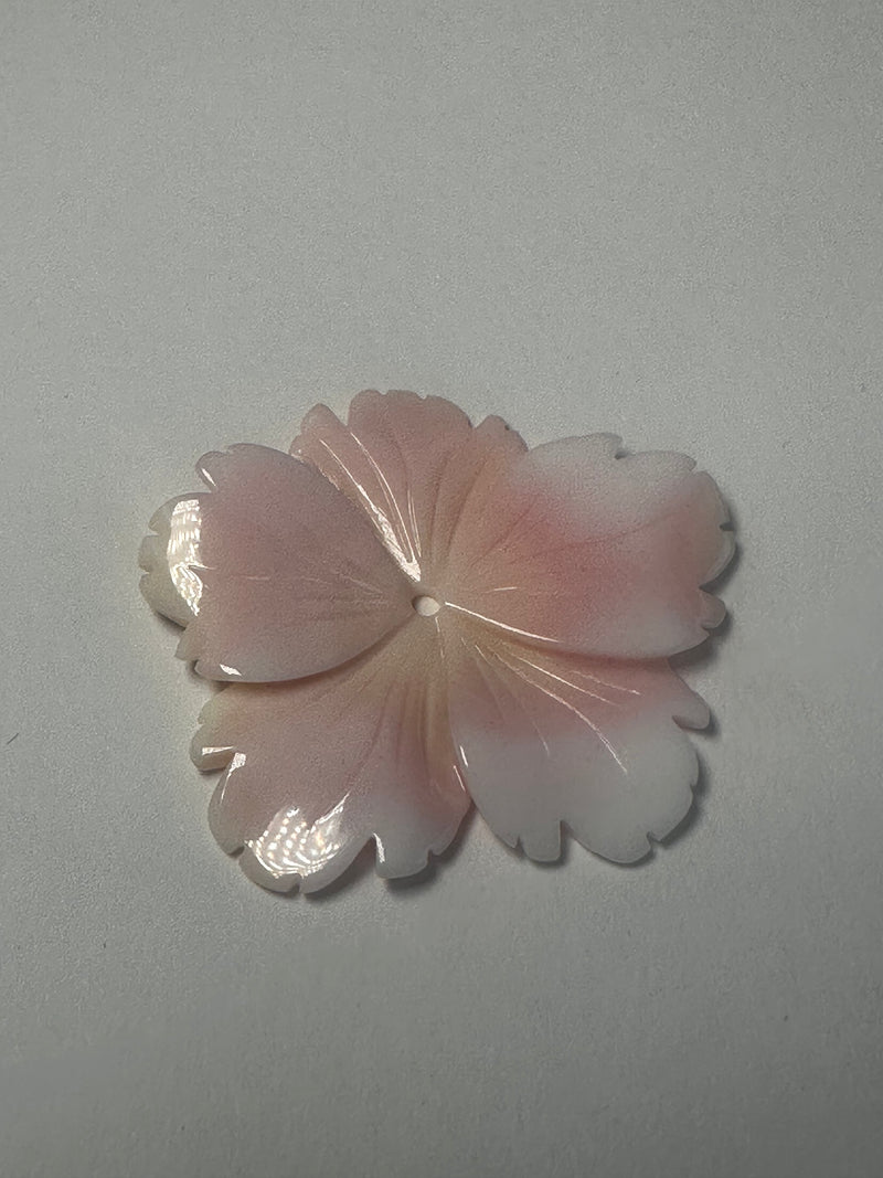 Conch shell flower carvings