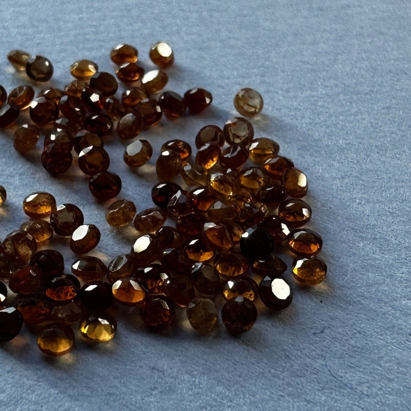 1.5mm Hessonite Garnet faceted round