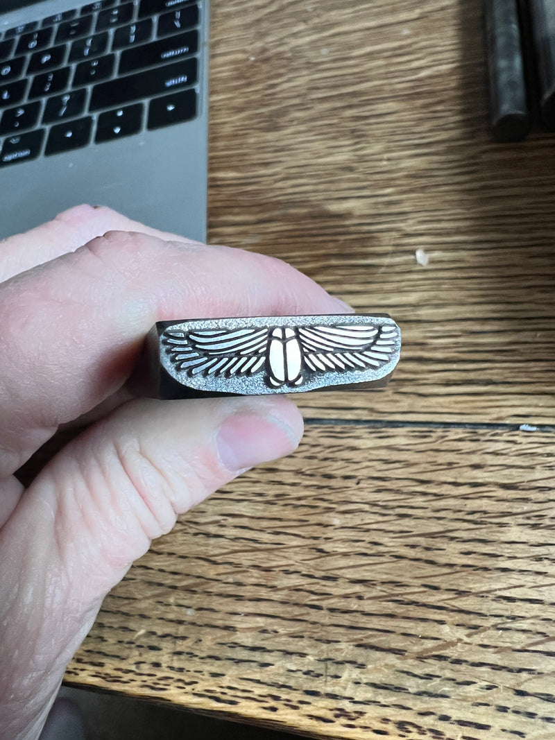 Winged scarab stamp