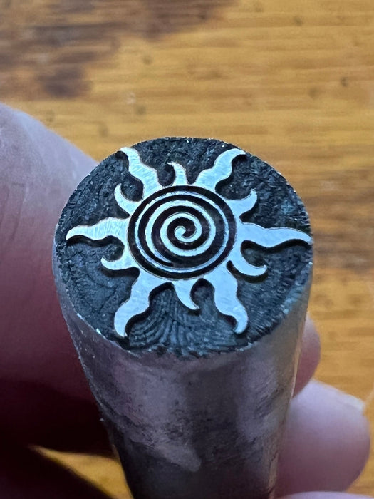 Spiral sun stamp
