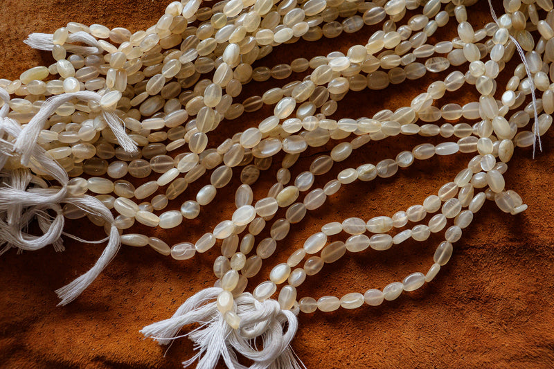 Light Pink Moonstone Beads 10x7mm flat oval