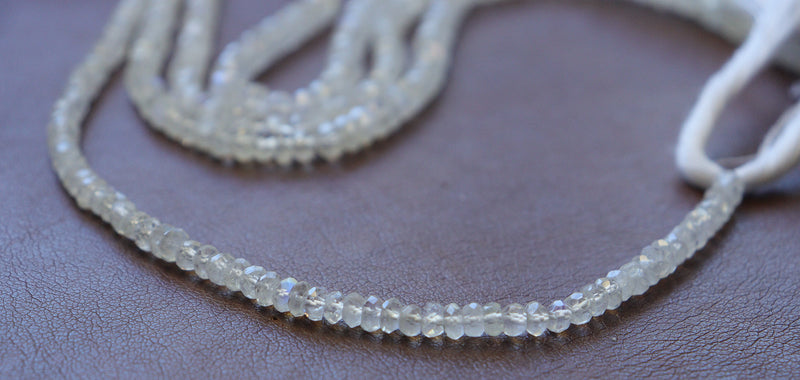 Cuentas de piedra lunar arco iris facetadas 4 mm-5,5 mm